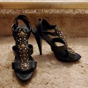 Strappy snakeskin heel with metal studs detailing